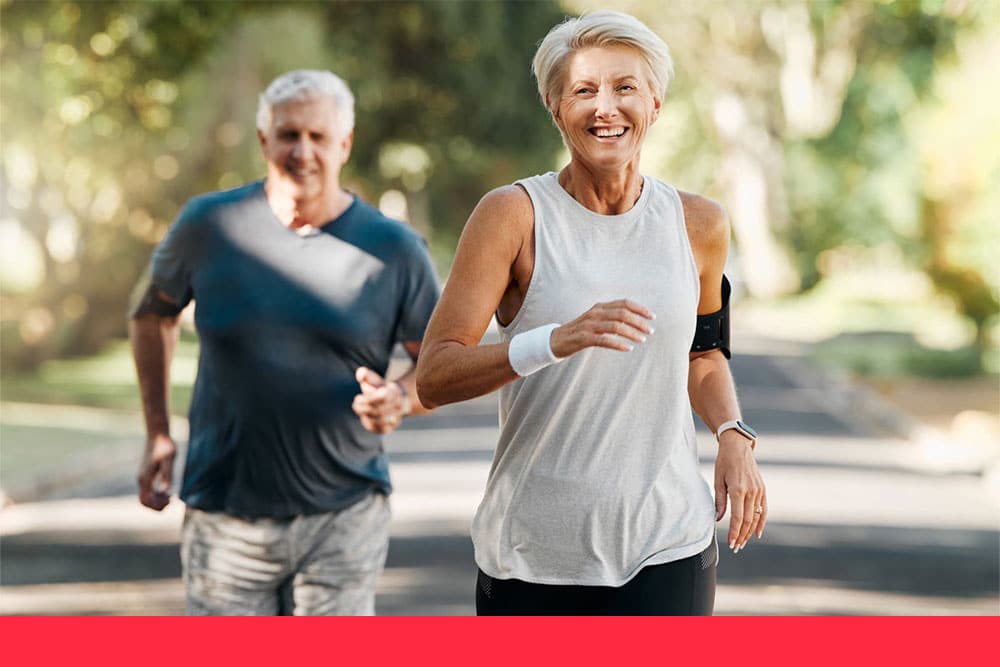 older couple jogging outdoors, embodying a heart smart lifestyle
